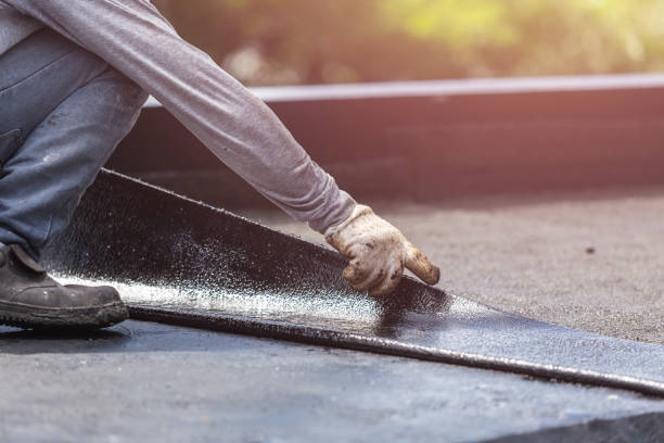 Professional Basement Waterproofing technician working in Shirley, NY